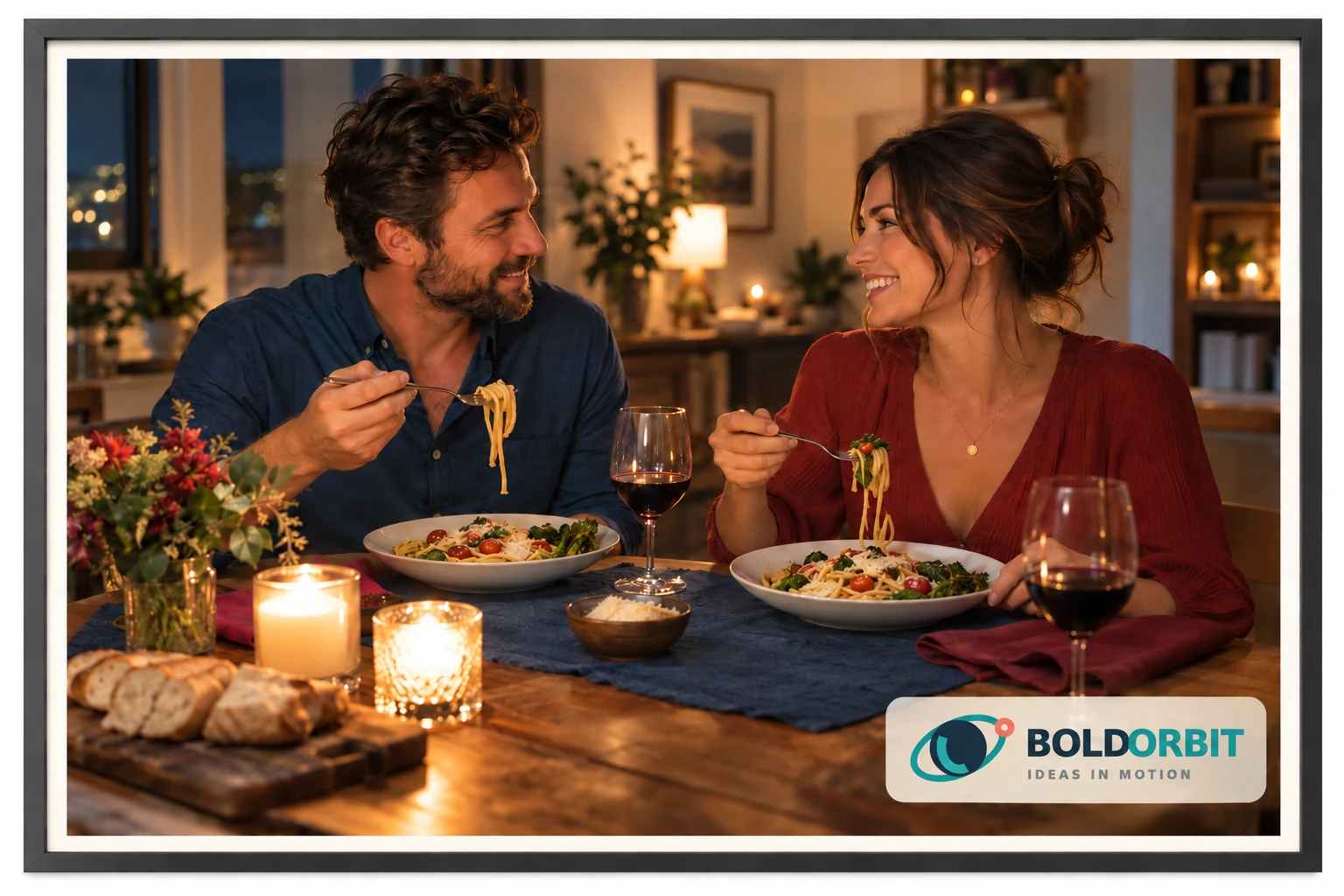 A couple enjoying dinner by candlelight in a modern frame, with the BoldOrbit logo inside the photograph